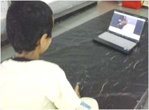 kid watching a video model